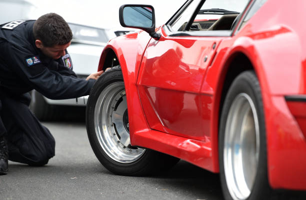inspect the rims of car tires of a car