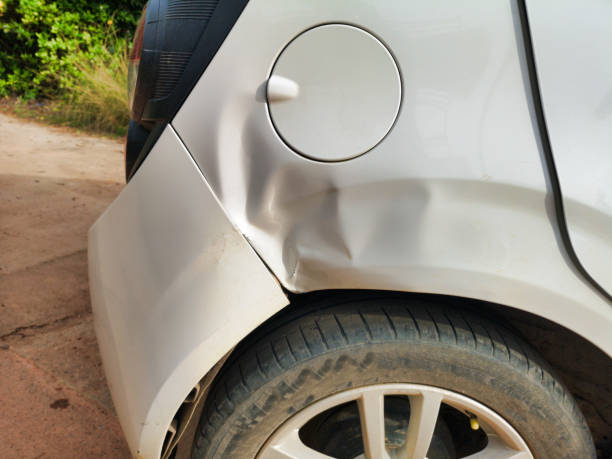 small car has sustained a dent to it’s rear quarter