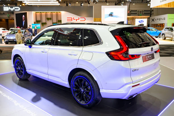 brand new white color Honda car in showroom