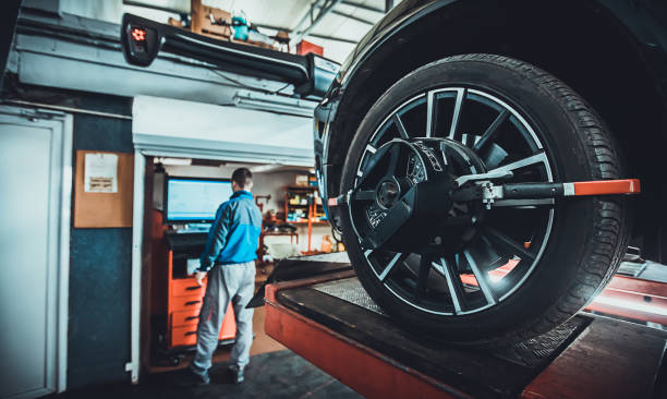 wheel alignment equipment on a car