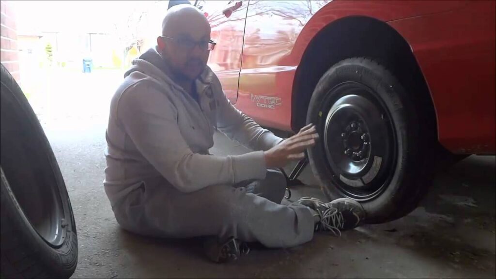 How to Put Spare Tire