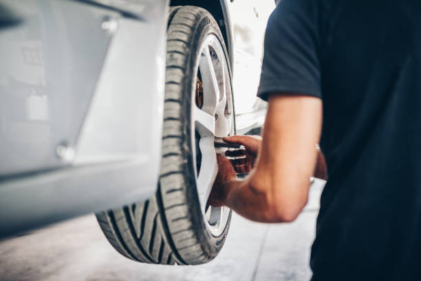 changing a car wheel in tire fitting